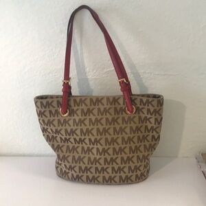 Michael Kors neutral tote with red straps